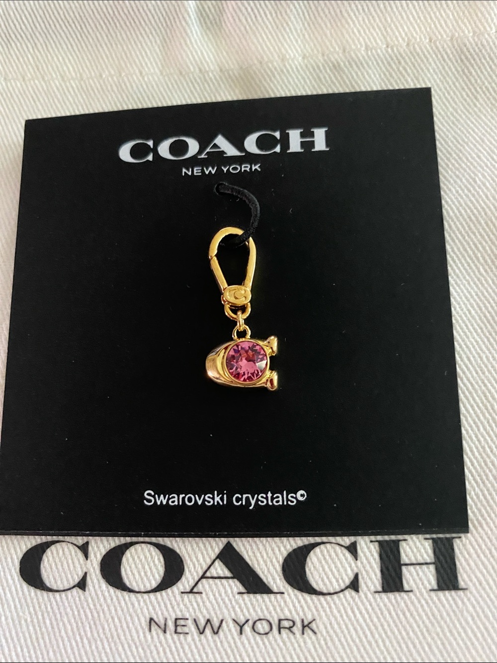 NWOT Coach Gold-Tone Charm with Pink Crystal